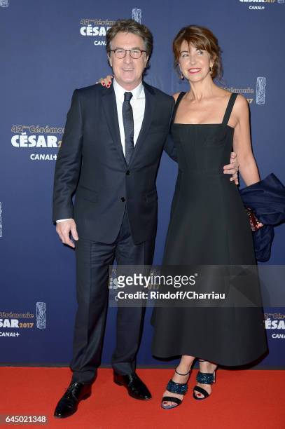 Francois Cluzet and Narjiss A. Cluzet arrive at the Cesar Film Awards Ceremony at Salle Pleyel on February 24, 2017 in Paris, France.