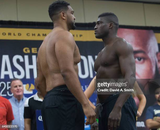 Boxers Dominic Breazeale and Izu Ugonoh face-off during their weigh-in for their heavyweight fight at BJCC on February 24, 2017 in Birmingham,...