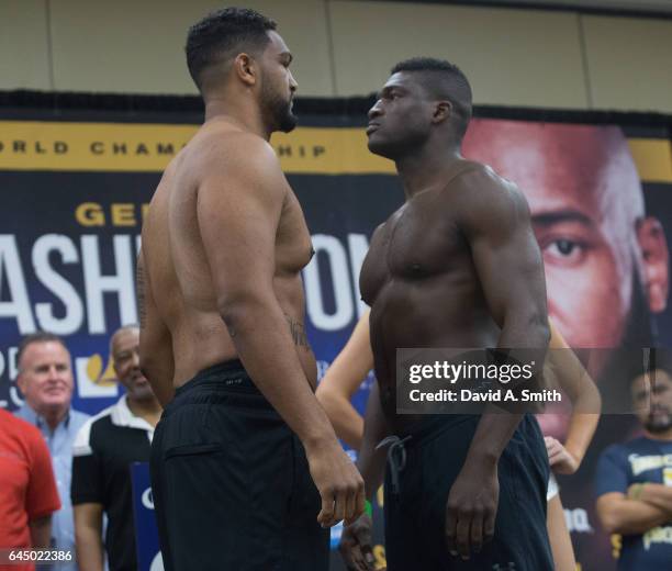 Boxers Dominic Breazeale and Izu Ugonoh face-off during their weigh-in for their heavyweight fight at BJCC on February 24, 2017 in Birmingham,...