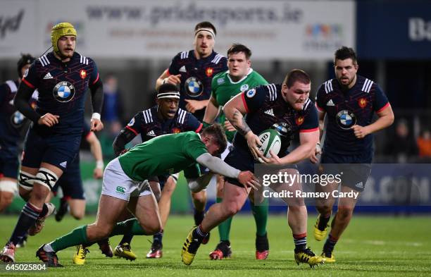 Leinster , Ireland - 24 February 2017; Thomas Laclayat of France is tackled by Bill Johnston of Ireland during the RBS U20 Six Nations Rugby...