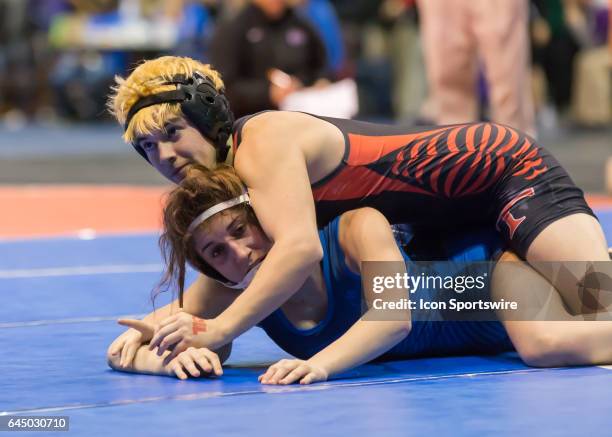 Trinity junior Mack Beggs wrestles Clear Springs senior Taylor Latham in the 6A Girls 110 Weight Class match during the Texas Wrestling State...