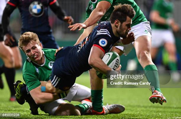 Leinster , Ireland - 24 February 2017; Arthur Retiere of France is tackled by Jonny Stewart of Ireland during the RBS U20 Six Nations Rugby...