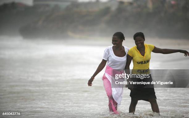 Maryam and her friend, who both work as kayayo girls, visit the beach and sea for the first time in their lives, in Accra. A kayayo is a market...