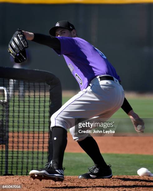 Colorado Rockies relief pitcher Adam Ottavino delivers a pitch during Spring Training at Salt River Fields at Talking Stick on February 24, 2017 in...