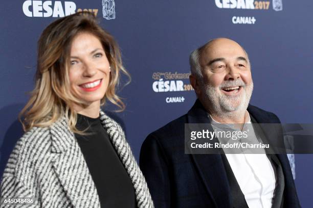 Patricia Campi and Gerard Jugnot arrive at the Cesar Film Awards Ceremony at Salle Pleyel on February 24, 2017 in Paris, France.