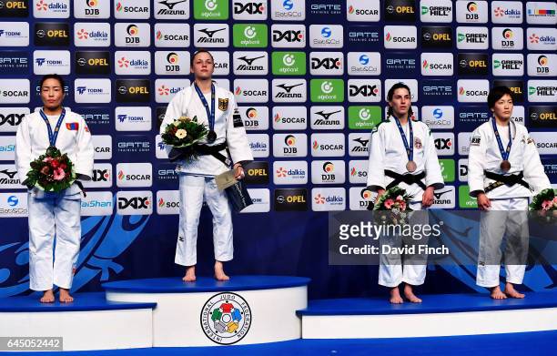 Under 57kg medallists L-R: Silver; Sumiya Dorjsuren of Mongolia, Gold; Theresa Stoll of Germany, Bronzes; Nae Udaka of Japan and Jovana Rogic of...