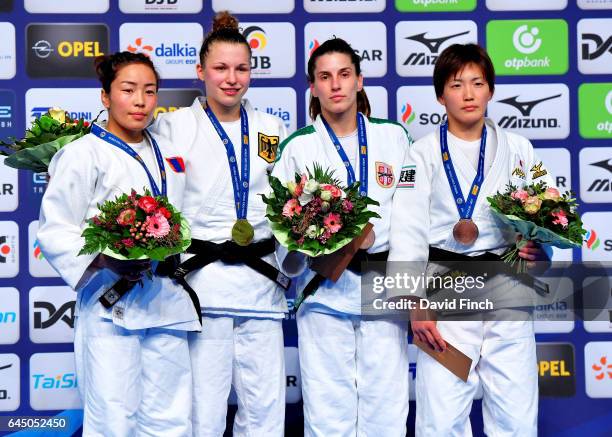 Under 57kg medallists L-R: Silver; Sumiya Dorjsuren of Mongolia, Gold; Theresa Stoll of Germany, Bronzes; Nae Udaka of Japan and Jovana Rogic of...