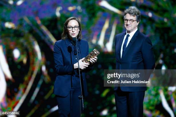 Celine Sciamma speaks on stage after she receives the Cesar of Best Adapted Screenplay for 'Ma vie de courgette' on stage during the Cesar Film...