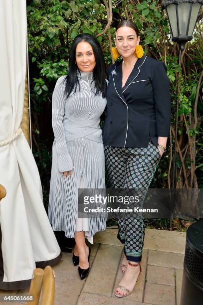 Goldston and Lupe Puerta attend NET-A-PORTER and Dr. Barbara Sturm Host Pre-Oscars Lunch in Los Angeles at Chateau Marmont on February 24, 2017 in...