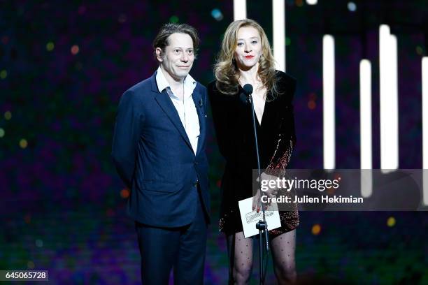 Mathieu Amalric and Sylvie Testud are seen on stage during the Cesar Film Awards Ceremony at Salle Pleyel on February 24, 2017 in Paris, France.