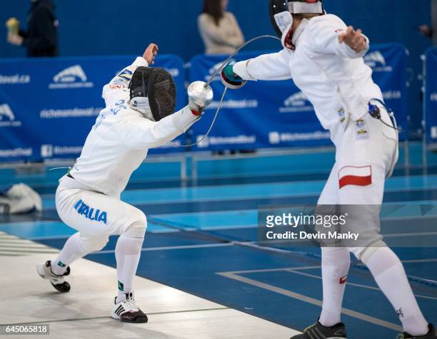 Paolo Pizzo of Italy attacks Jan Wenglarczyk of Poland during action at the Peter Bakonyi Senior Men's Epee World Cup on February 18th, 2017 at the...