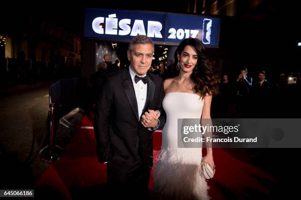 George Clooney and Amal Clooney arrive at the Cesar Film Awards 2017 at Salle Pleyel on February 24, 2017 in Paris, France.