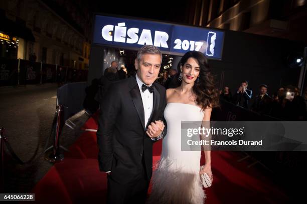 George Clooney and Amal Clooney arrive at the Cesar Film Awards 2017 at Salle Pleyel on February 24, 2017 in Paris, France.