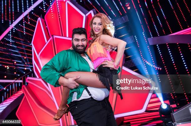 Faisal Kawusi and Oana Nechiti pose on stage after the pre-show 'Wer tanzt mit wem? Die grosse Kennenlernshow' of the television competition 'Let's...