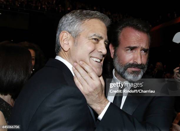 George Clooney and Jean Dujardin attend Cesar Film Award 2017 at Salle Pleyel on February 24, 2017 in Paris, France.