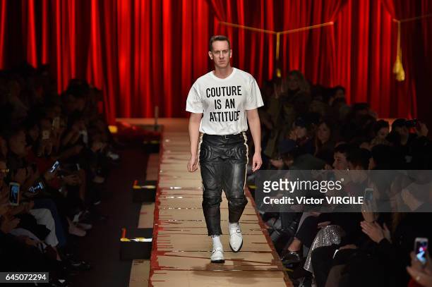Fashion designer Jeremy Scott walks the runway at the Moschino Ready to Wear fashion show during Milan Fashion Week Fall/Winter 2017/18 on February...