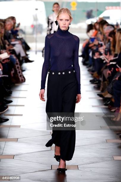 Model walks the runway at the Tory Burch show during the New York Fashion Week February 2017 collections on February 14, 2017 in New York City.