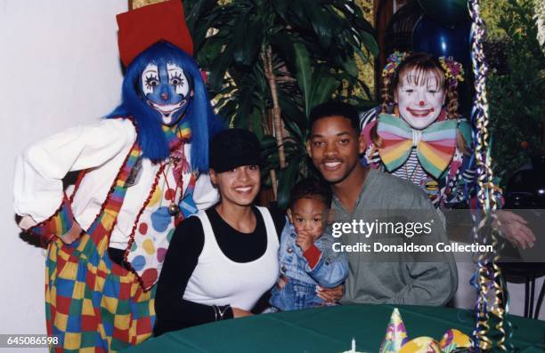 Will Smith and his wifeSheree Zampino hold their son Trey Smith while clowns look on at his second birthday party on November 14, 1992 in Los...