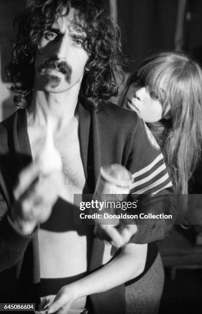 Rock musician and composer Frank Zappa and his wife Gail pose for a portrait session for the cover of the album "Absolutely Free" at home in 1967 in...