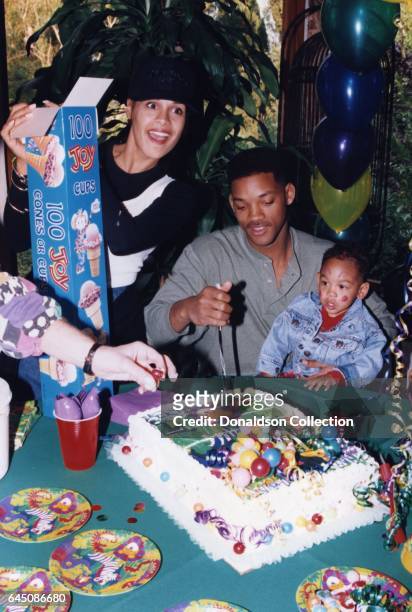 Will Smith and his wife Sheree Zampino hold their son Trey Smith at his second birthday party on November 14, 1992 in Los Angeles, California .