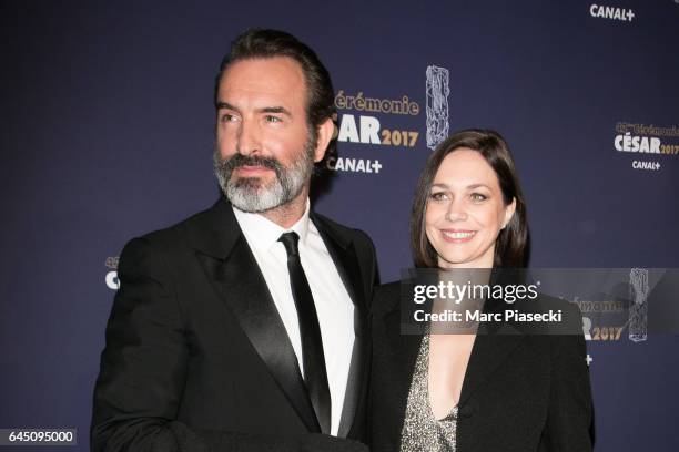 Actor Jean Dujardin and Nathalie Pechalat attend the the Cesar Film Awards 2017 ceremony at Salle Pleyel on February 24, 2017 in Paris, France.