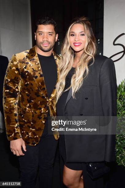 Player Russell Wilson and singer Ciara attend Vanity Fair and Genesis Celebrate "Hidden Figures" on February 24, 2017 in Los Angeles, California.