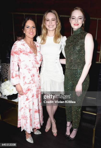 President of Women In Film Cathy Schulman, actors Brie Larson and Emma Stone attend the tenth annual Women in Film Pre-Oscar Cocktail Party presented...