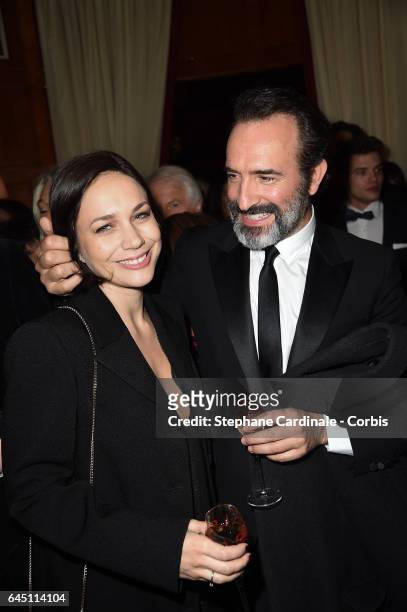 Nathalie Pechalat and Jean Dujardin attend the Cesar Dinner at Le Fouquet's on February 24, 2017 in Paris, France.