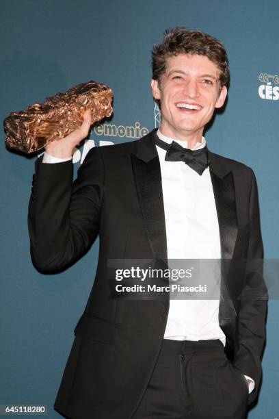 Niels Schneider poses with his award at the Cesar Film Awards 2016 at Salle Pleyel on February 24, 2017 in Paris, France.