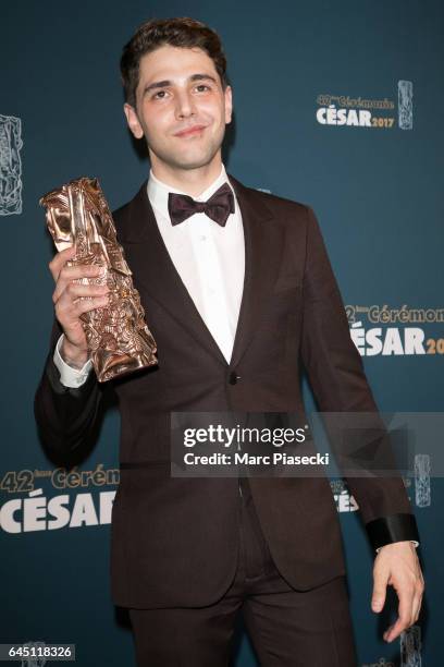 Director Xavier Dolan poses with his award at the Cesar Film Awards 2016 at Salle Pleyel on February 24, 2017 in Paris, France.