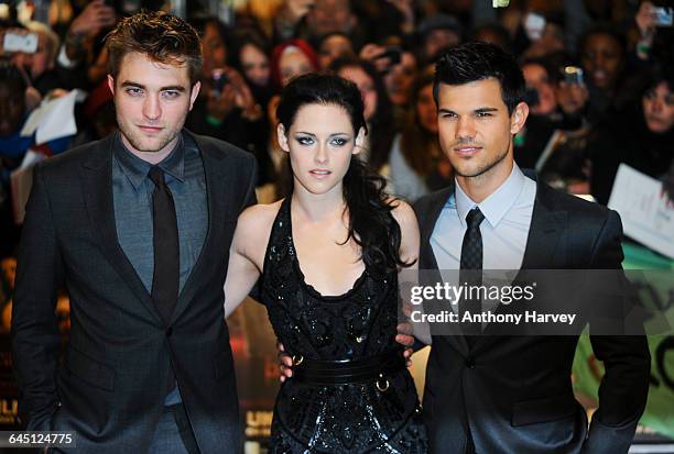 Robert Pattinson, Kristen Stewart and Taylor Lautner attend the UK premiere of The Twilight Saga: Breaking Dawn Part 1 at Westfield Stratford City on...