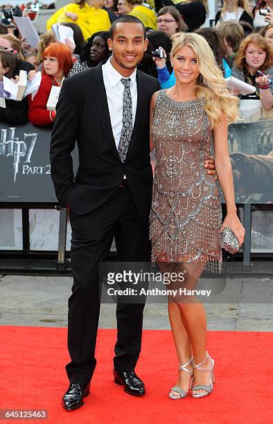 Footballer Theo Walcott and Melanie Slade attend the 'Harry Potter and the Deathly Hallows: Part 2' Premiere in Trafalgar Square on July 07, 2011 in...