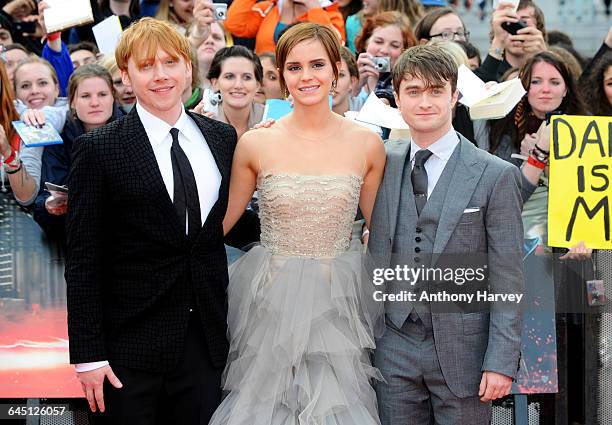 Actor Rupert Grint, Emma Watson and Daniel Radcliffe attend the 'Harry Potter and the Deathly Hallows: Part 2' Premiere in Trafalgar Square on July...
