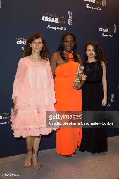 Houda Benyamina, Deborah Lukumuena and Oulaya Amamra attend the Cesar's Dinner at Le Fouquet's on February 24, 2017 in Paris, France.