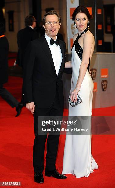 Alexandra Edenborough and Gary Oldman attend the 2012 Orange British Academy Film Awards on February 12, 2012 at The Royal Opera House in London.