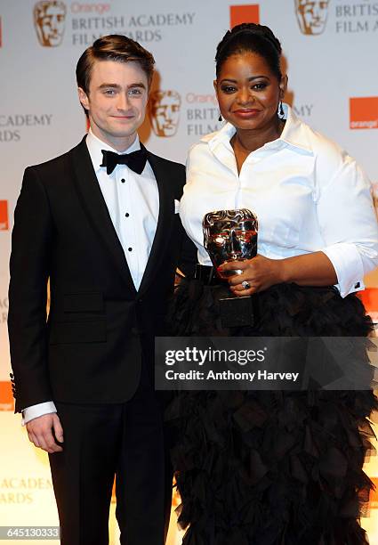 Octavia Spencer, Daniel Radcliffe in the press room at poses in the press room during the 2012 Orange British Academy Film Awards on February 12,...