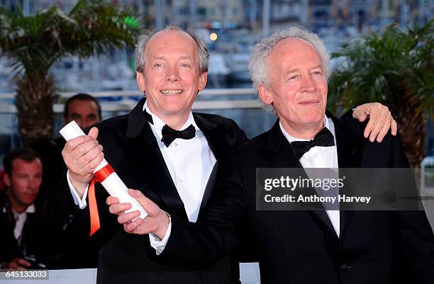 Directors Luc Dardenne and Jea-Pierre Dardenne pose at the Palme d'Or Winners Photocall at the Palais des Festivals during the 64th Cannes Film...