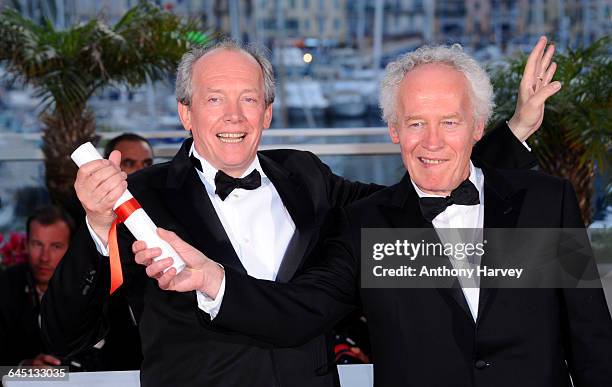 Directors Luc Dardenne and Jea-Pierre Dardenne pose at the Palme d'Or Winners Photocall at the Palais des Festivals during the 64th Cannes Film...