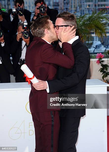 Actor Ryan Gosling and Nicolas Winding Refn pose at the Palme d'Or Winners Photocall at the Palais des Festivals during the 64th Cannes Film Festival...
