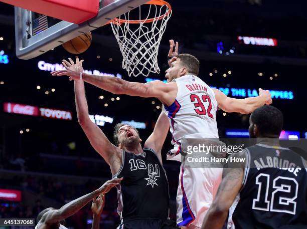 Pau Gasol of the San Antonio Spurs is fouled by Blake Griffin of the LA Clippers during a 105-97 Spurs win at Staples Center on February 24, 2017 in...