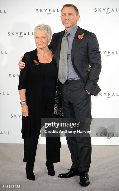 Dame Judi Dench and Daniel Craig attend the photocall for the 23rd James Bond film, Skyfall on November 3, 2011 at the Massimo Restaurant in London.