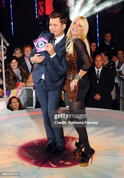 Pamela Bach and Host Brian Dowling arrive as a guests in the Big Brother House at Elstree Studios on August 18, 2011 in Borehamwood, England.