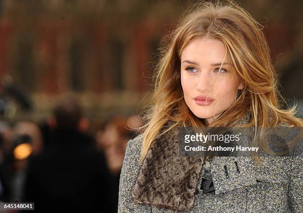 Rosie Huntington-Whiteley attends the Burberry Autumn Winter 2012 Womenswear Front Row during London Fashion Week at Kensington Gardens on February...