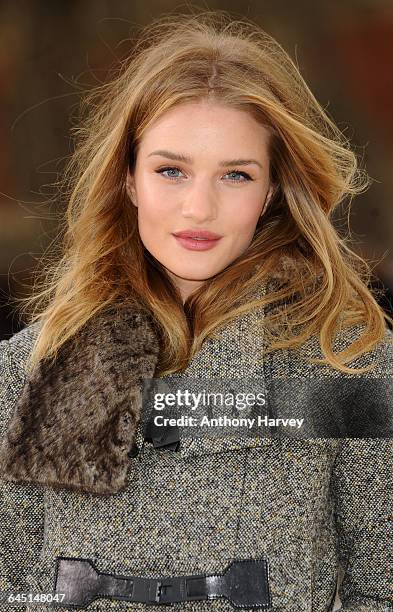 Rosie Huntington-Whiteley attends the Burberry Autumn Winter 2012 Womenswear Front Row during London Fashion Week at Kensington Gardens on February...