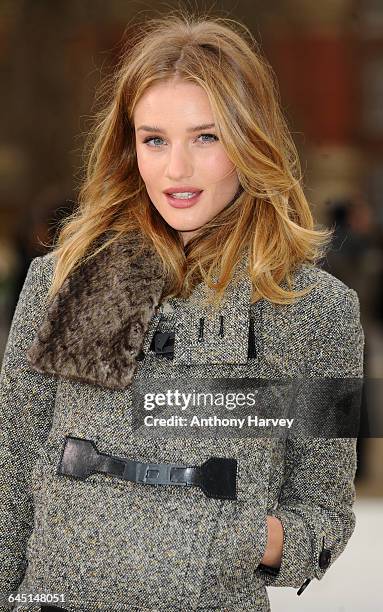 Rosie Huntington-Whiteley attends the Burberry Autumn Winter 2012 Womenswear Front Row during London Fashion Week at Kensington Gardens on February...