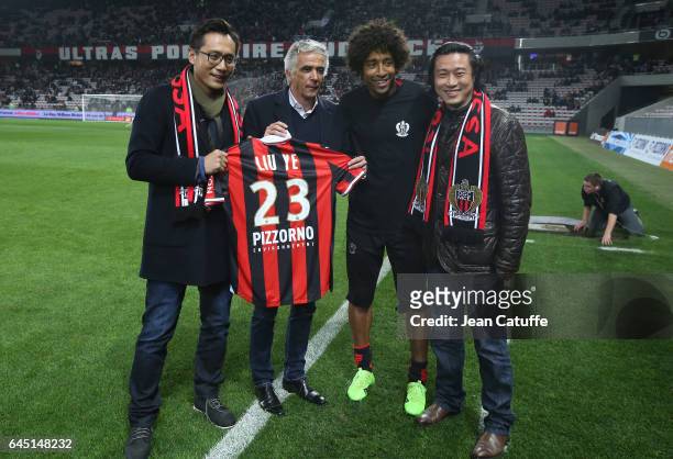 Chines actor Liu Ye receives a Nice shirt from President of OGC Nice Jean-Pierre Rivere, Brazilian player of Nice Dante, chinese investor in OGC Nice...