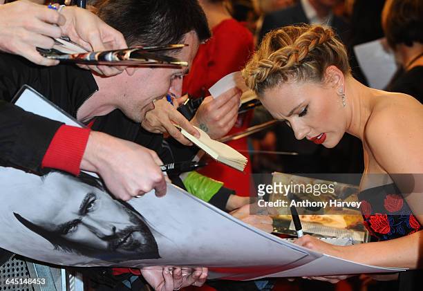 Scarlett Johansson attends the Marvel Avengers Assemble European Premiere on April 19, 2012 at the Vue Cinema, Westfield Shepards Bush in London.