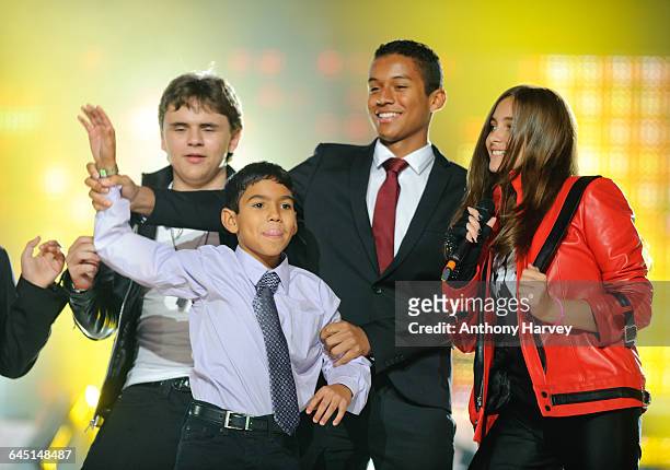 Members of the Jackson family, including his children Paris, Prince Michael Jr and Blanket on stage at the 'Michael Forever' Michael Jackson tribute...