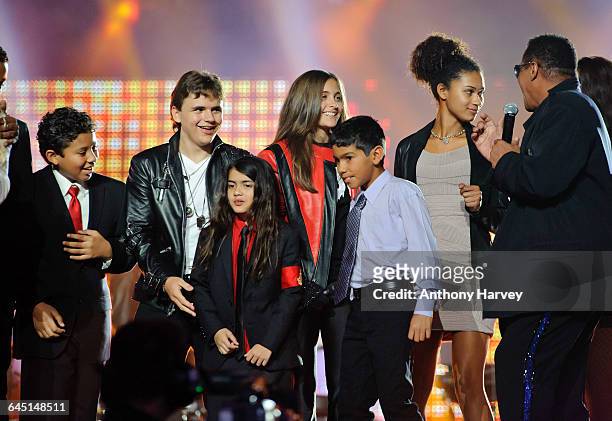 Members of the Jackson family, including his children Paris, Prince Michael Jr and Blanket on stage at the 'Michael Forever' Michael Jackson tribute...