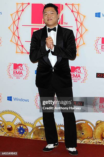 Singer Psy poses backstage with his award for Best Video in the photo room at the MTV EMA's 2012 at Festhalle Frankfurt on November 11, 2012 in...